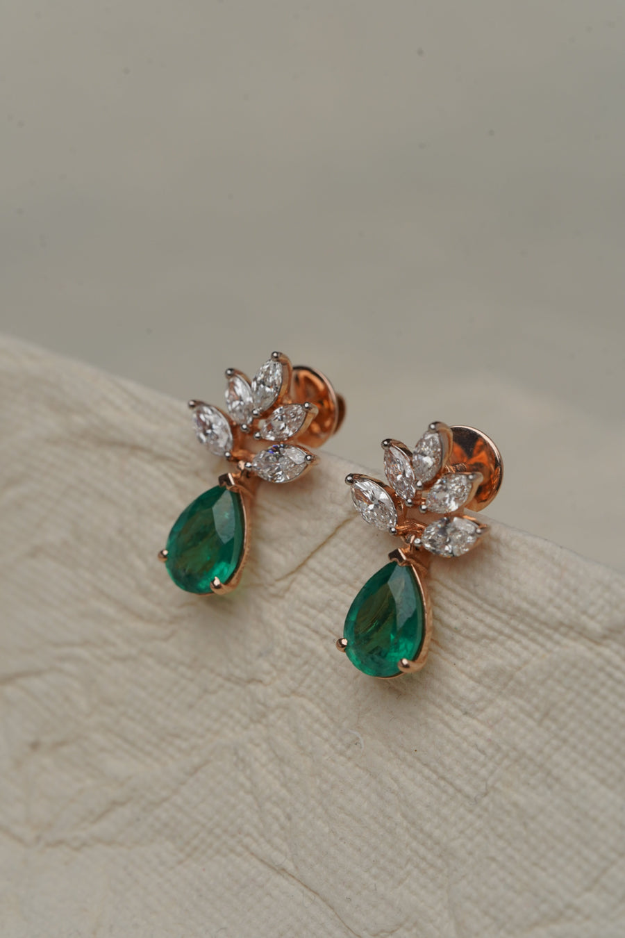 Emerald and diamond drop earrings for a celebration